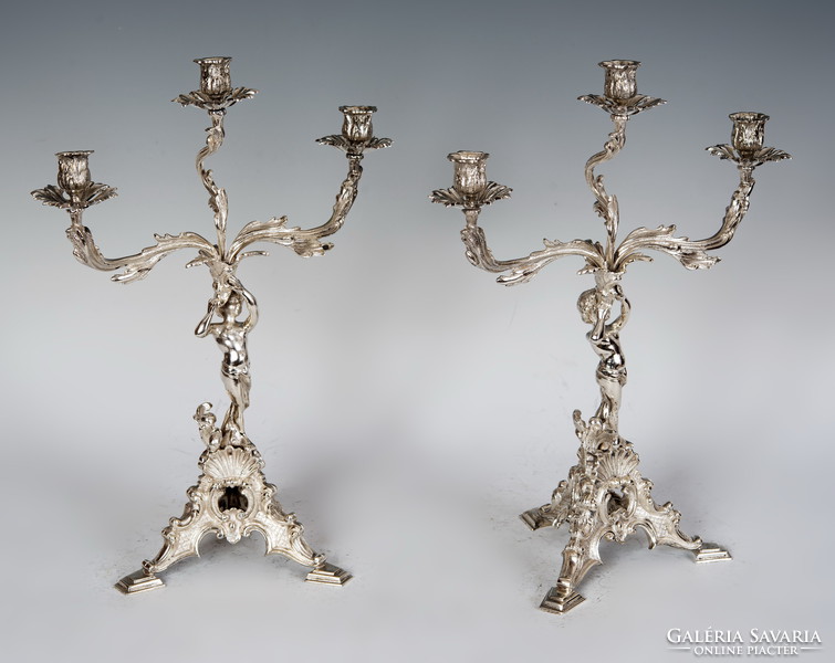 Silver figural candlestick in pairs