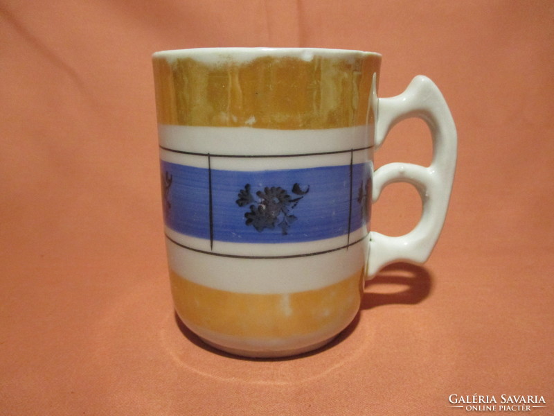 Antique mug with special handles and cup