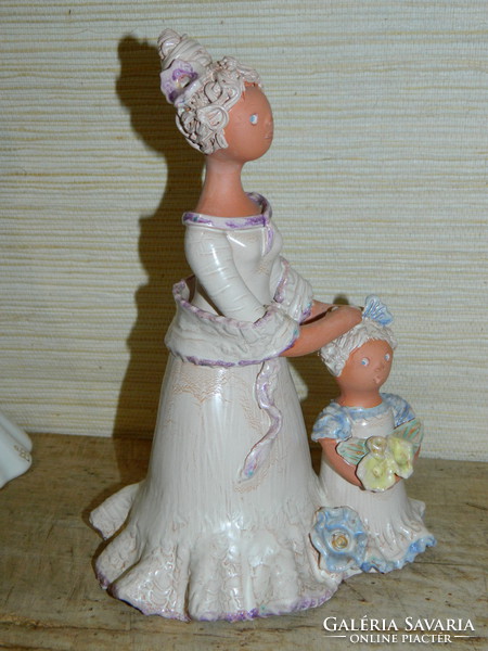 Marked pottery mother and daughter