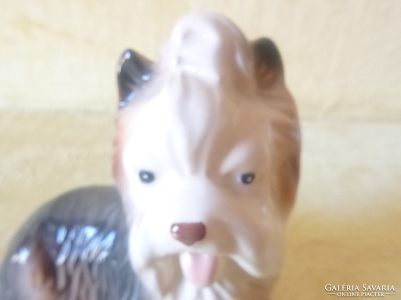 Ceramic dog figure.