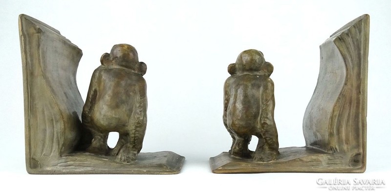 1G700 recessed art deco ceramic monkey book support pair from the 1930s