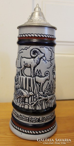 Beautiful ceramic jar with huge embossed tin top