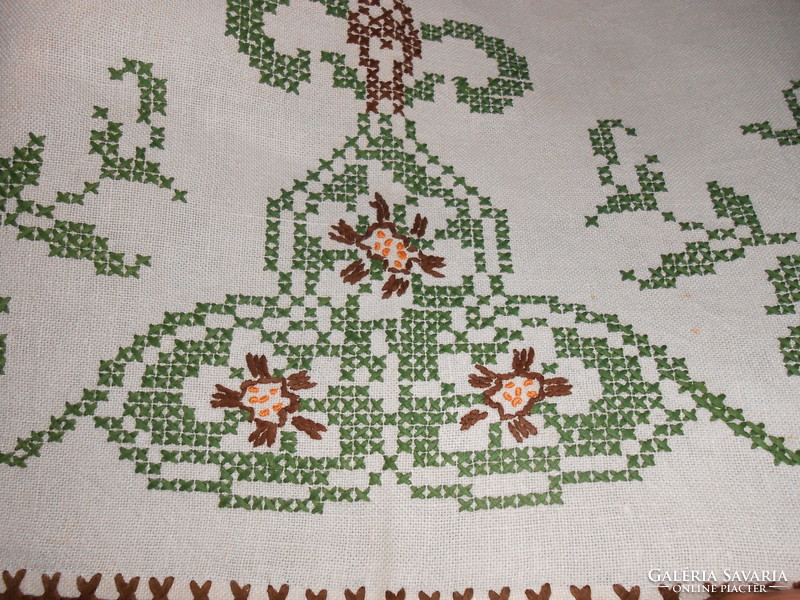 Antique hand embroidered linen tablecloth.