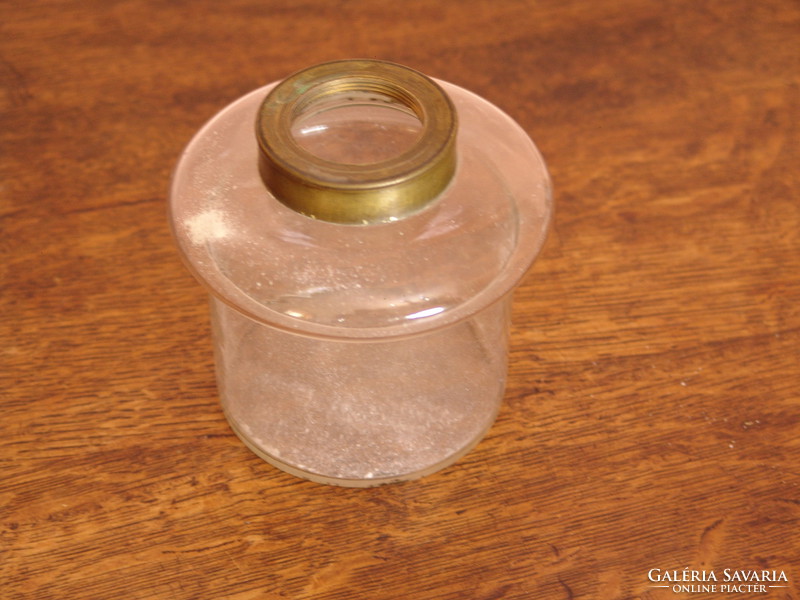 Kerosene lamp in glass container