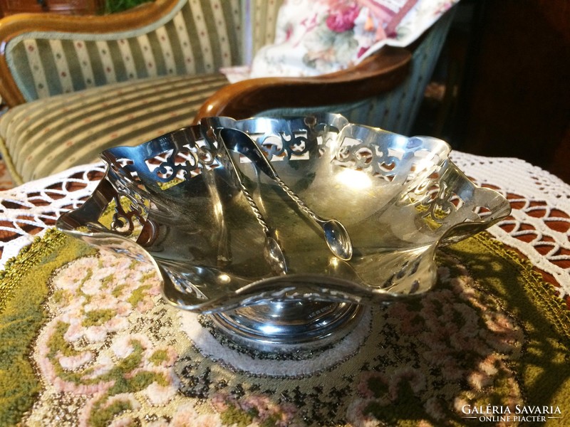 Luxurious, silver-plated, antique, pierced-edged bowl of delicacy or sugar cubes with sugar tongs
