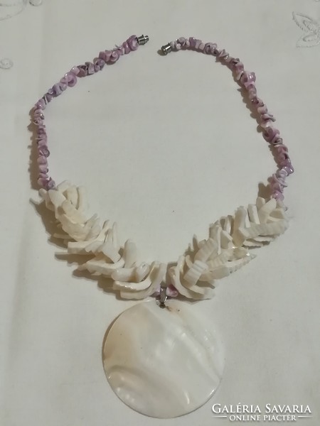 Necklace made of snails and shells with a large pendant
