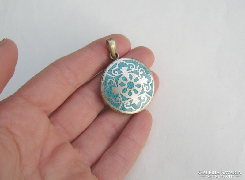 Old large alpaca pendant with turquoise inserts