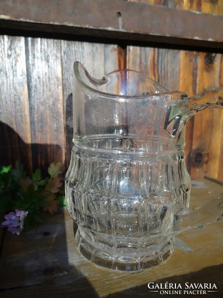 Nice lined old glass pitcher pouring