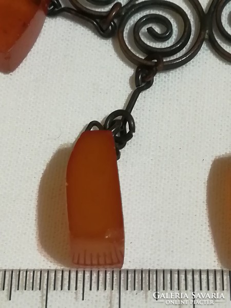 Antique chain with a pendant decorated with amber.