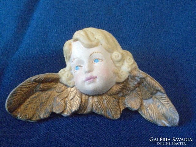 Porcelain angel is a very old piece