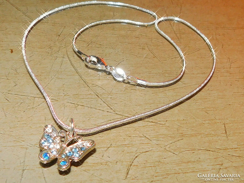 Turquoise blue crystal butterfly on white gold filled necklace
