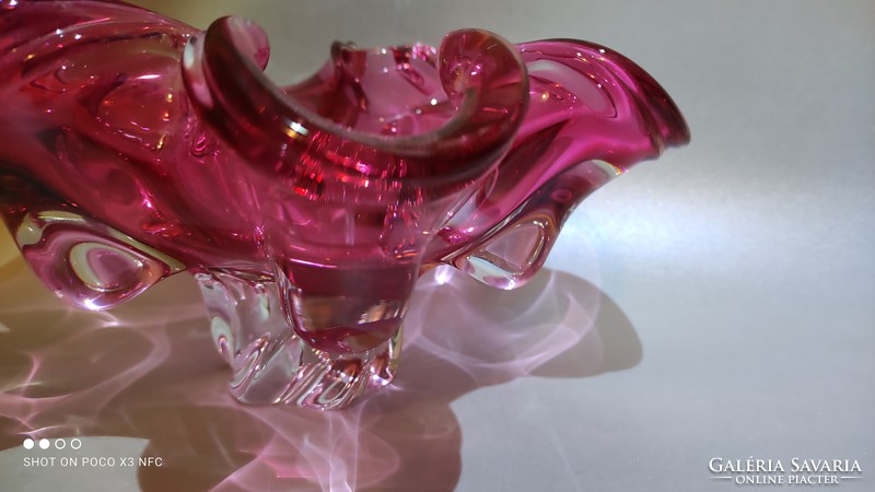 Offering curled glass with heavy ruffled mouth