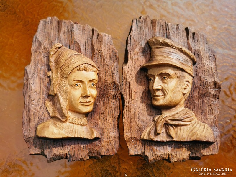 Antique female and male portrait, carved wall decoration