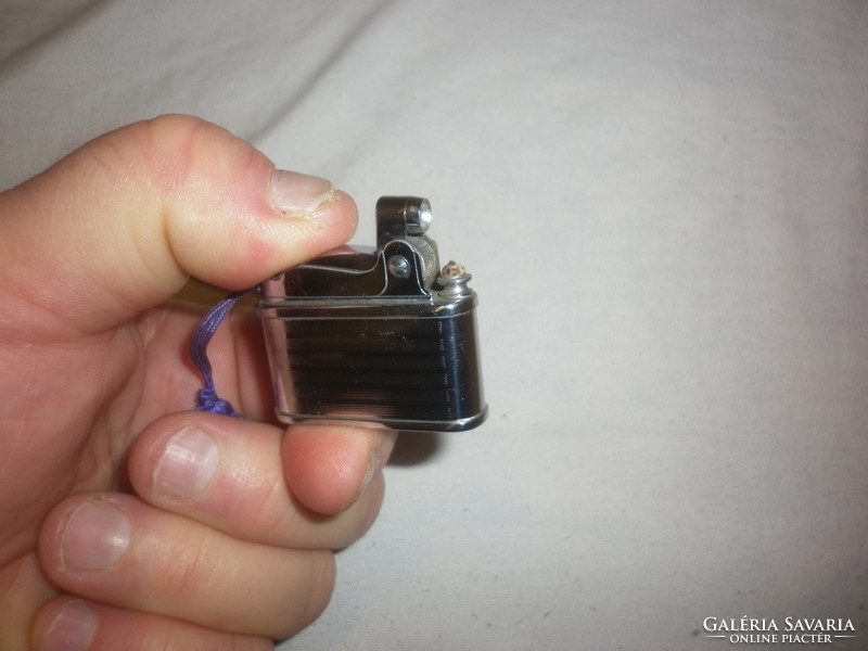 Old retro small pigeon gasoline lighter