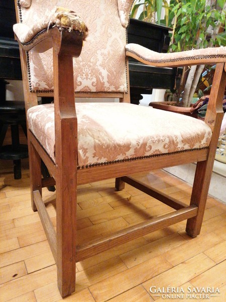 Antique armchair with handles, throne chair. Large, very old, structure is good stable.