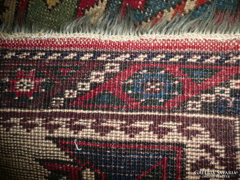 Antique Caucasian Kazakh rug in very nice condition (used only as a wall protector)