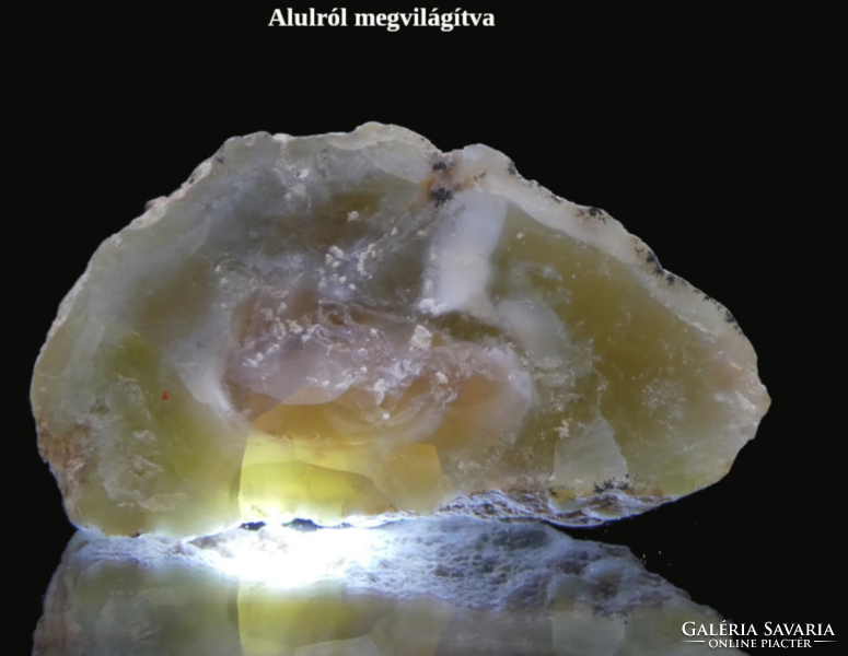 Natural green opal nugget with pale orange seeds in the middle. Collectible mineral. 15 Grams