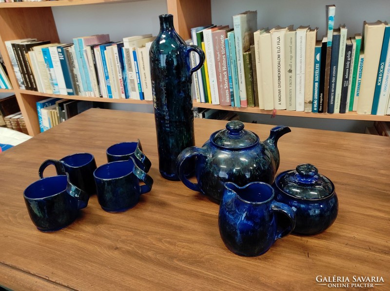 Unusual, decorative, dark blue ceramic tea/coffee set with ingredients and vase