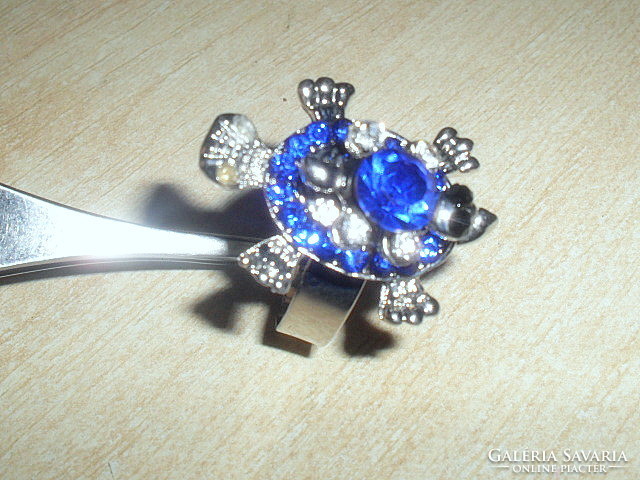 Tibetan silver ring with rotatable head section with a small tortoise of a London blue crystal stone