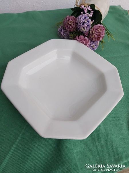 Beautiful old white porcelain serving garnished bowl, nostalgia, peasant decoration