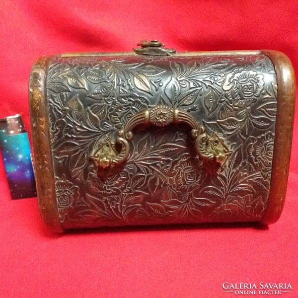 Wooden chest box with copper, printed leather decoration.