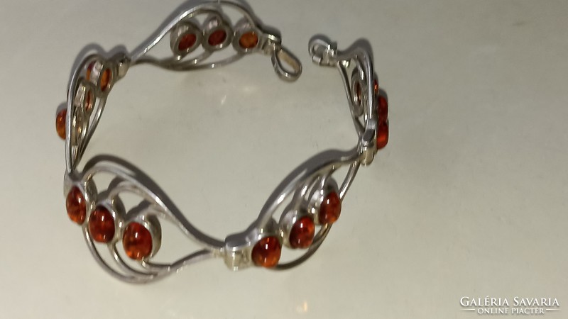 Silver bracelet decorated with amber stones 925