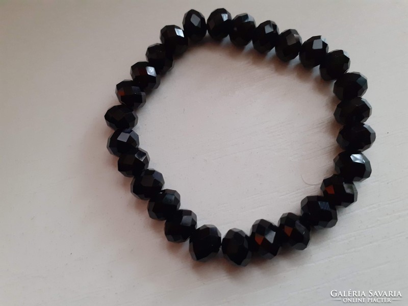 Rubber bracelet made of black polished Czech crystal eyes