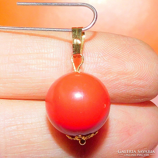 Coral red lacy ornate sphere gilded pendant