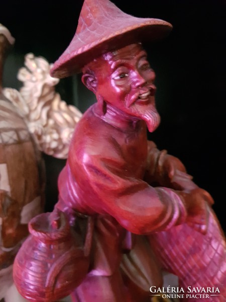 Carved Chinese fisherman figurine