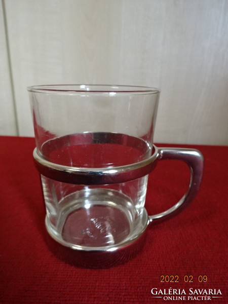 Glass tea cup in metal holder. The metal is German and the glass is French. He has! Jókai.