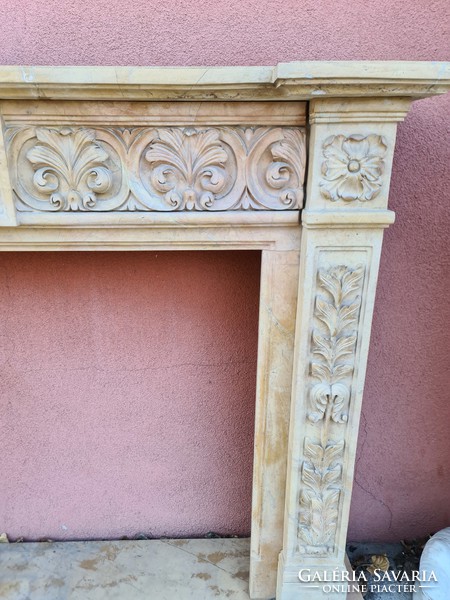 Brown-beige marble fireplace frame