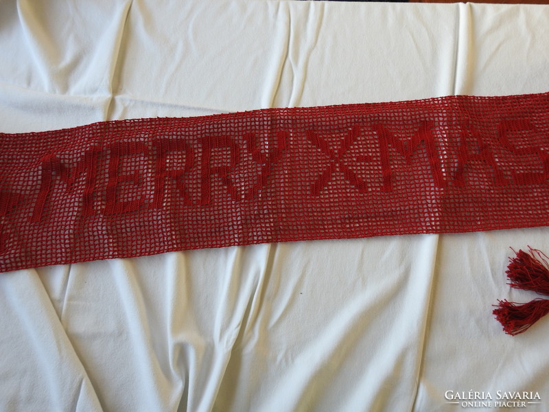 Red big scarf with fringed ends crocheted with stars with the inscription Marry- xmas