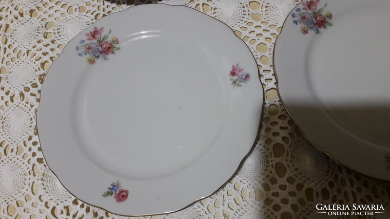 Beautiful, floral, Bulgarian, porcelain cake on a small plate with a golden edge