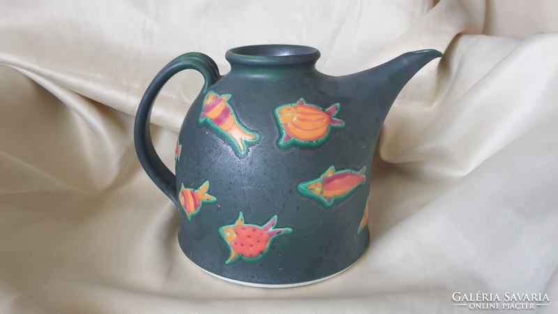 Teapot pouring into Rita's curve mug