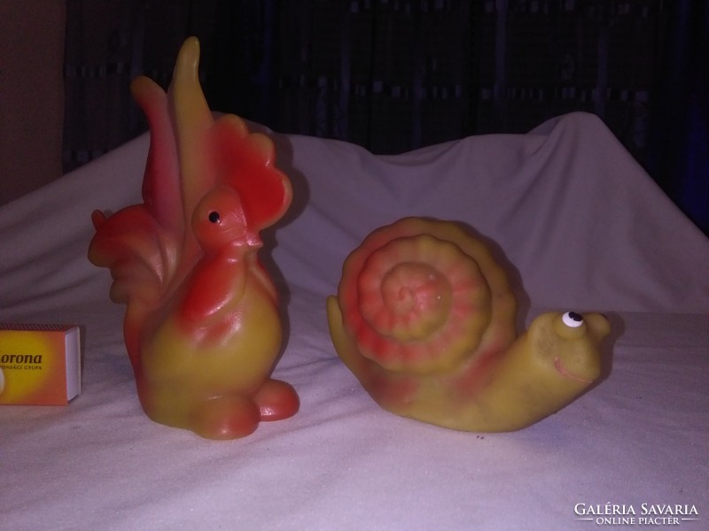 Old beeping, whistling rubber toy rooster and snail - together