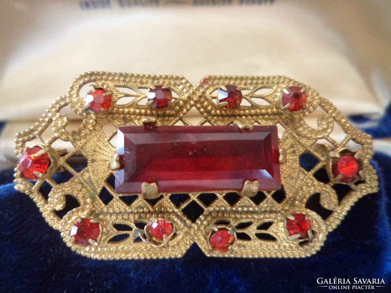 Antique filigree brooch with red stones