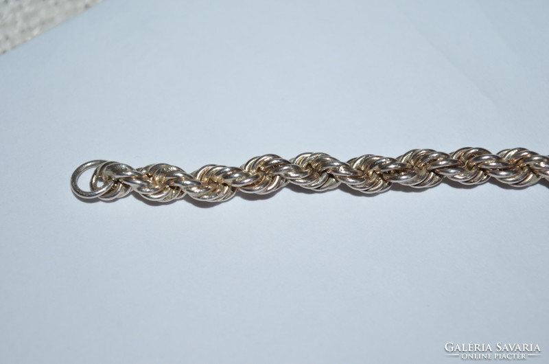 Twisted bracelet with rare switch / hook