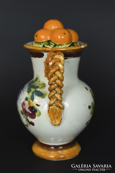 Italian painted ceramic jug with braided handles