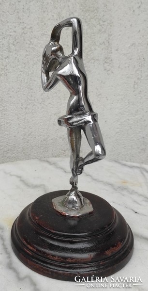 Art deco dancing lady statue on a wooden pedestal, chrome-plated