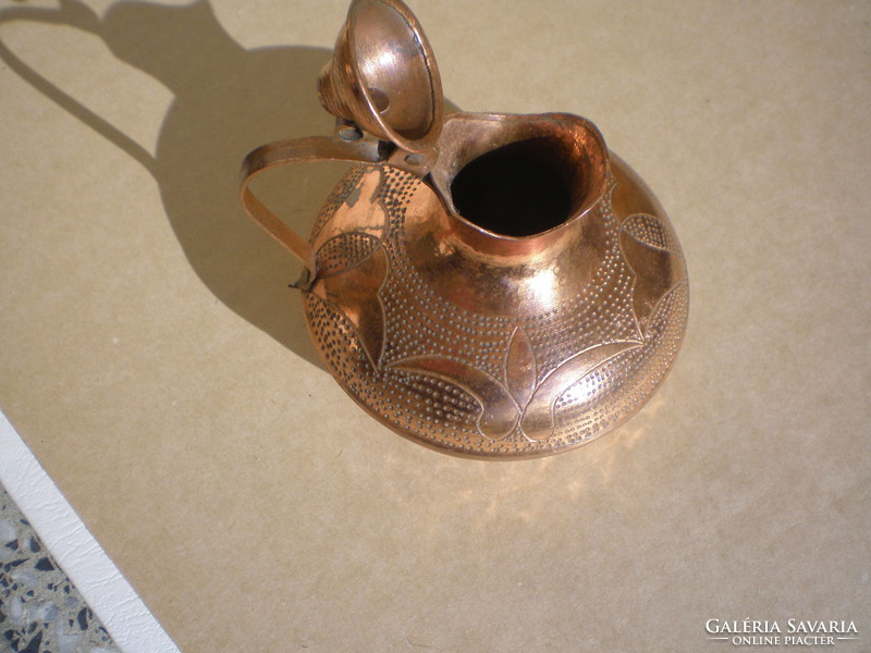 Red copper jug, decorated. Nice goldsmith work. Height: 9.5 cm, width: 10 cm.