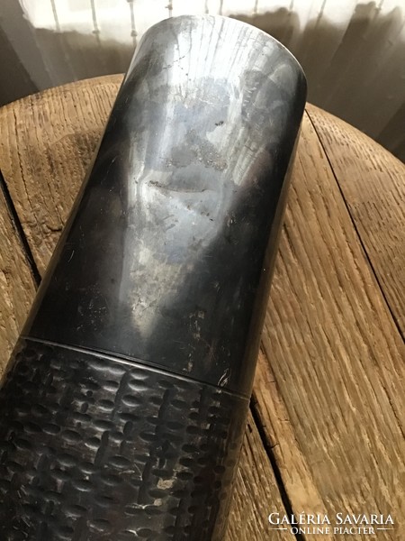 Old silver-plated vase with a small flaw
