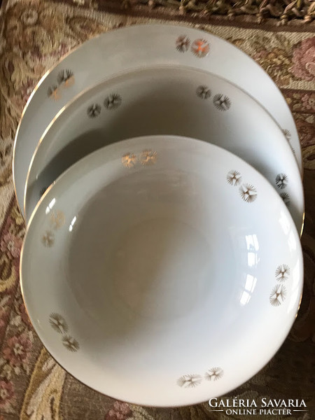 White porcelain garnished bowls