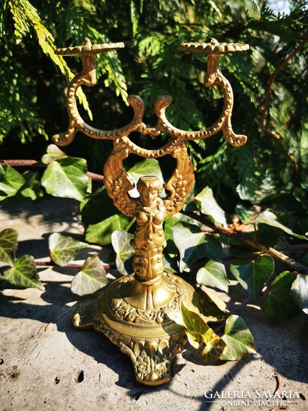 Antique two-armed angel candlestick