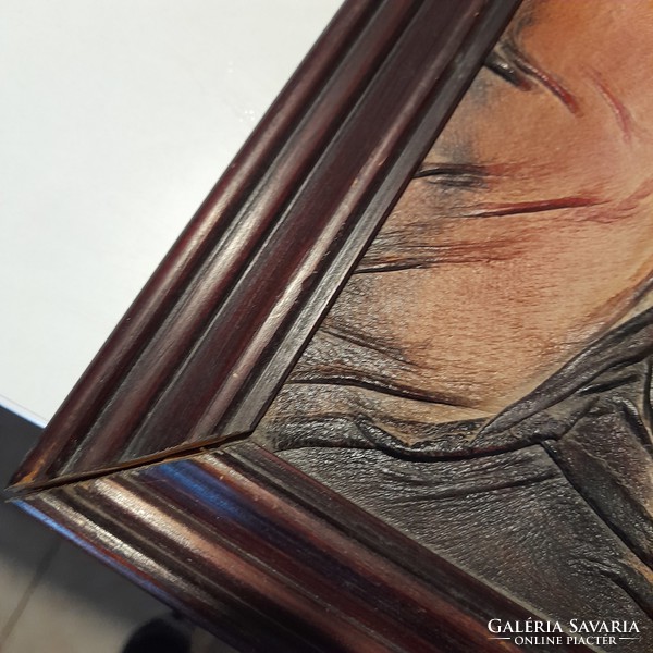 Leather picture in wooden frame