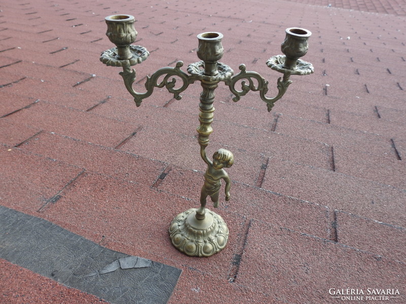 Pair of old heavy bronze three-pronged table candlesticks