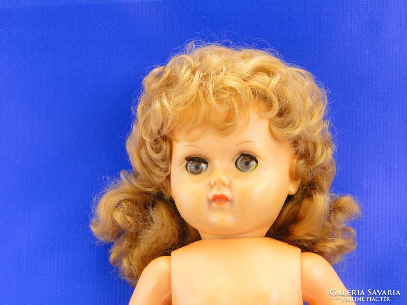 0A131 Rubber head plastic doll