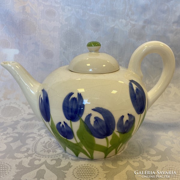 Porcelain teapot with tulips