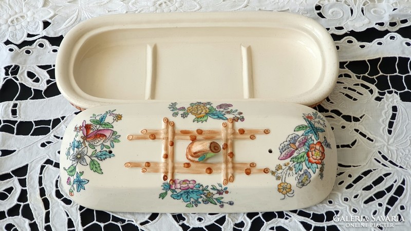 Antique, porcelain toothbrush or soap dish.