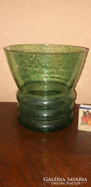 Large, hollow green glass vase