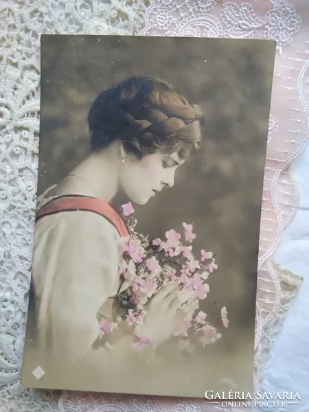 Antique tinted postcard / photo lady with braided hair wreath, flowers 1918